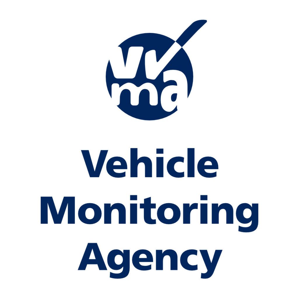 Logo for the Vehicle Monitoring Agency, UK. A dark blue circular emblem features the lowercase initials “v”, “✔”, “m”, and “a” in white, with the “✔” character stylised at the top as a large checkmark integrated into the blue circular and extending beyond the circle. Beneath the emblem, the agency name “Vehicle Monitoring Agency” is set in bold, sans-serif type, stacked in three lines and coloured in matching dark blue.