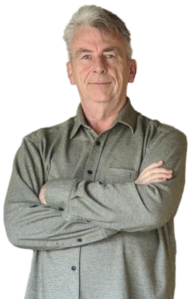 Dayne Smith standing in studio welcoming clients.